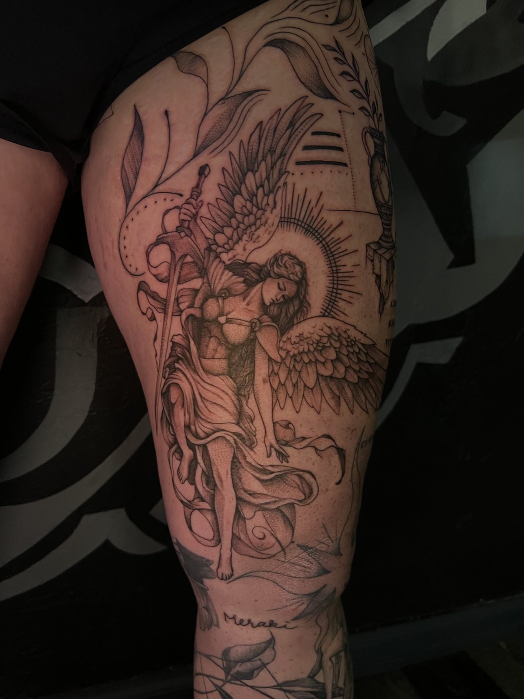 Winged warrior angel with sword, thigh tattoo by Bri, Kustom Tattoo Club