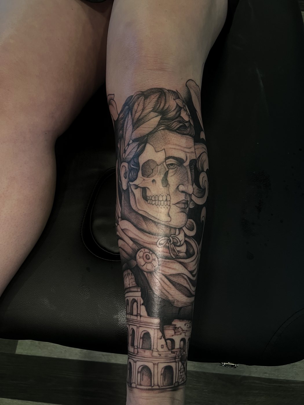 Roman emperor half skull with Colosseum, forearm tattoo by Bri, Kustom Tattoo Club