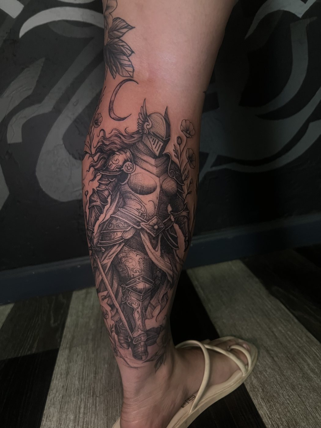 Armored knight with crescent moon, calf tattoo by Bri, Kustom Tattoo Club